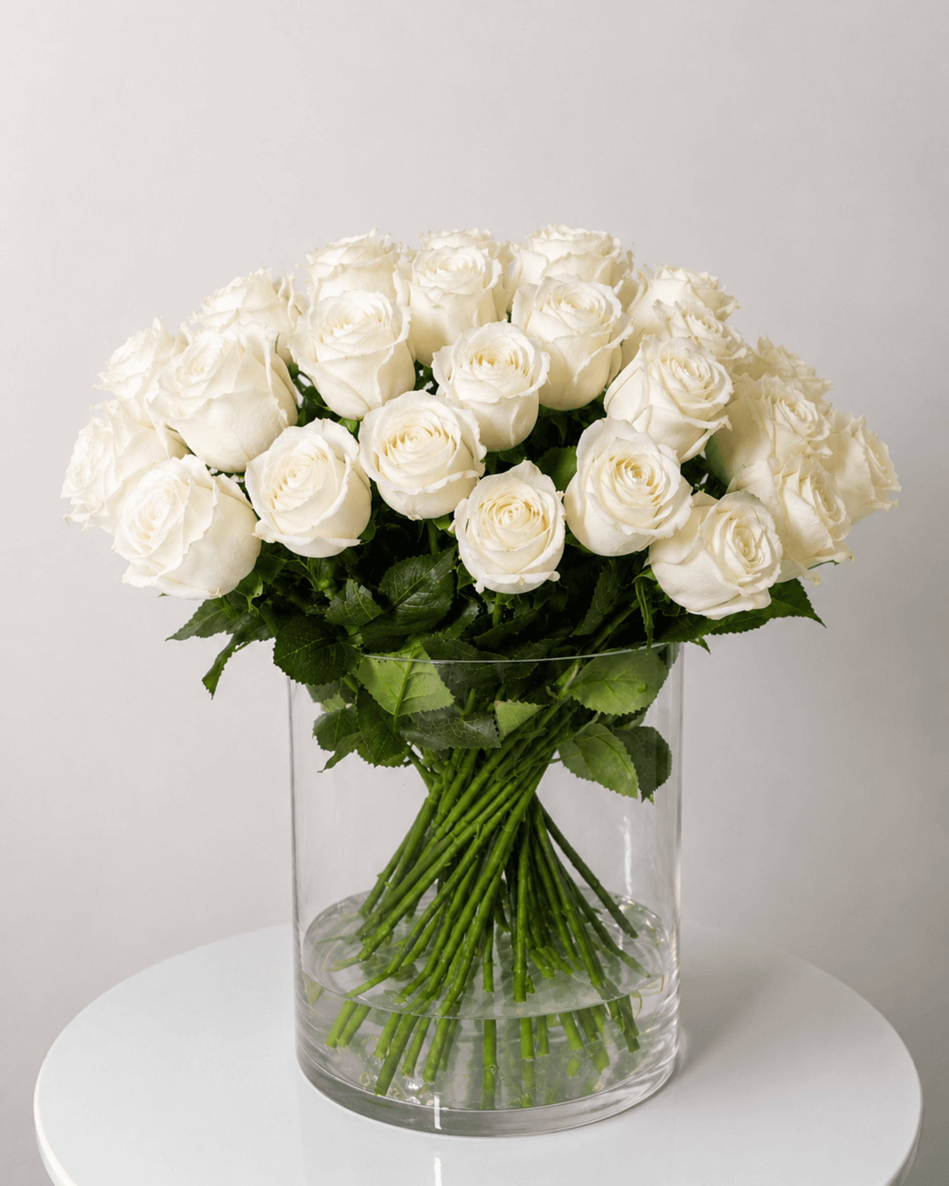 Artificial White Roses in Glass Vase | ZAHRÁ Home Dubai